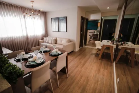 Sofa minimalis berwarna abu-abu yang empuk sebagai bagian dari furnitur rumah yang nyaman di ruang tamu